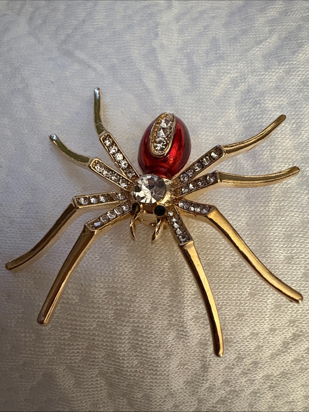 Gold-tone Spider Brooch with Red Accent and Clear Crystals